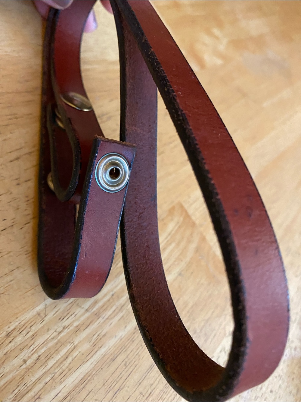 Wine color 26” strap with knob for bag in good condition